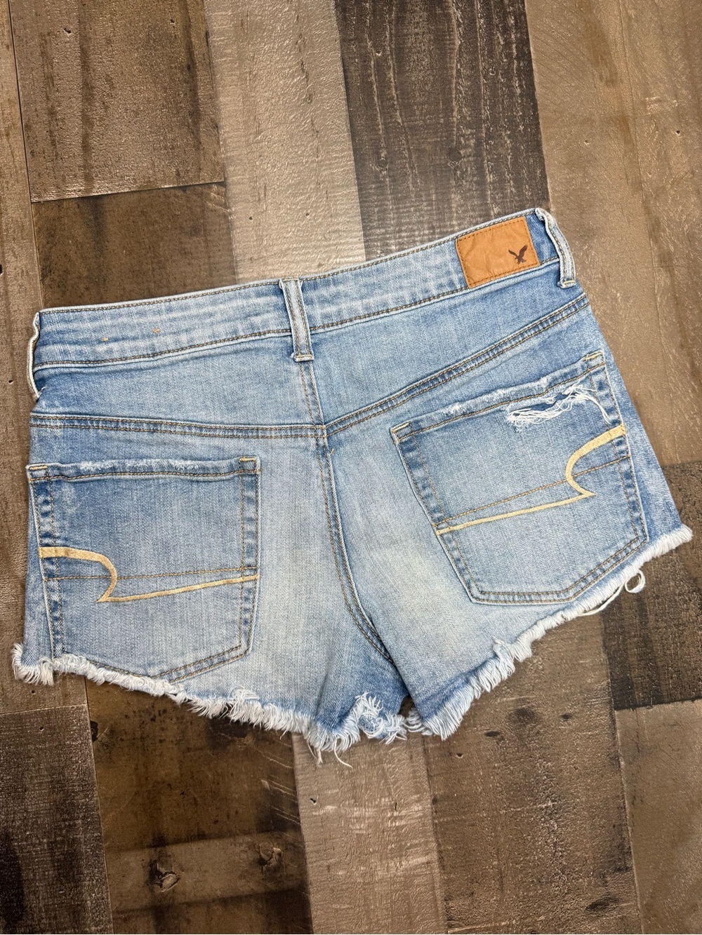 American Eagle Outfitters Hi-Rise Festival Light Wash Distressed Denim Shorts 4 - Picture 2 of 12